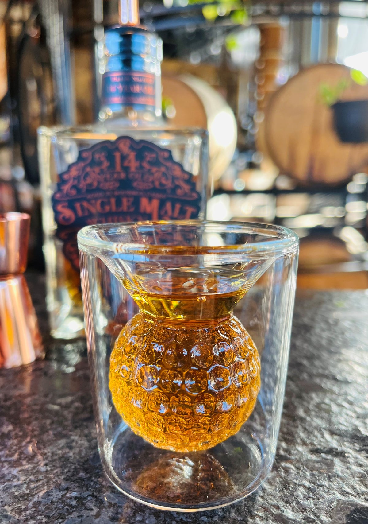 Hole in one - shot glass